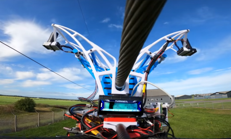 Drones that can charge on power lines
