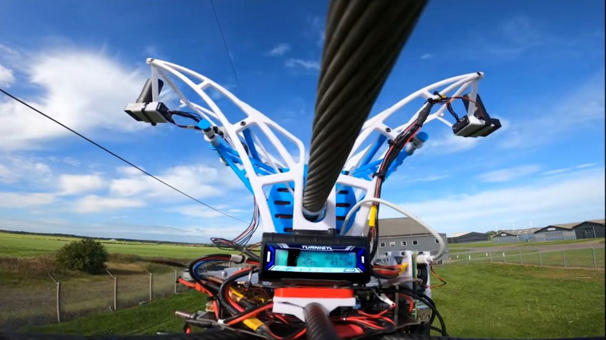 Drones that can charge on power lines